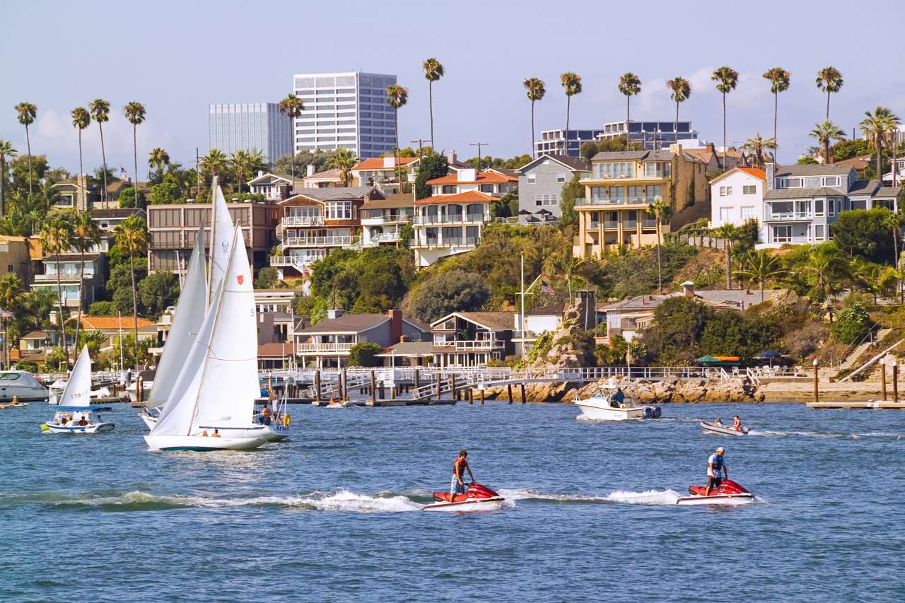 The scenic Entrance Channel offers boats of all types easy access to Newport Harbor and Newport Bay.